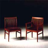 
      Sedia in tek. Poltroncina in tek.
      Teak-wood chair. Teak-wood little armchair.
      