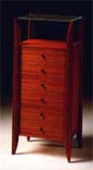 
      Cassettiera in teak.
      Teak-wood chest-of-drawers.
      cm. 64x50 h140
      